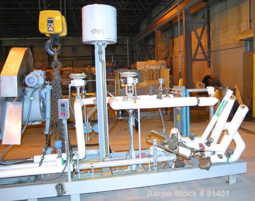 USED: Niro twin shaft extractor, model A-640, 316 stainless steel. Jacketed chamber, (2) 4-1/2" diameter shafts, each with 4 rows of approx 10" wide continuous ribbons. Driven by a 1.3 kw motor with ...
