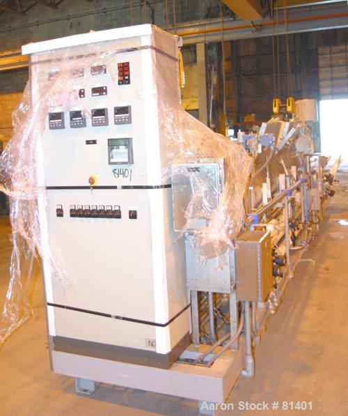USED: Niro twin shaft extractor, model A-640, 316 stainless steel. Jacketed chamber, (2) 4-1/2" diameter shafts, each with 4 rows of approx 10" wide continuous ribbons. Driven by a 1.3 kw motor with ...