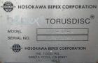 Used Hosokawa Bepex Torus Disc Dryer, Model TDJS-12-4, 316L Stainless Steel. Approximately 5.2 cubic feet working capacity. Approximately 12-1/2'' diameter x 50-1/2'' long x 14