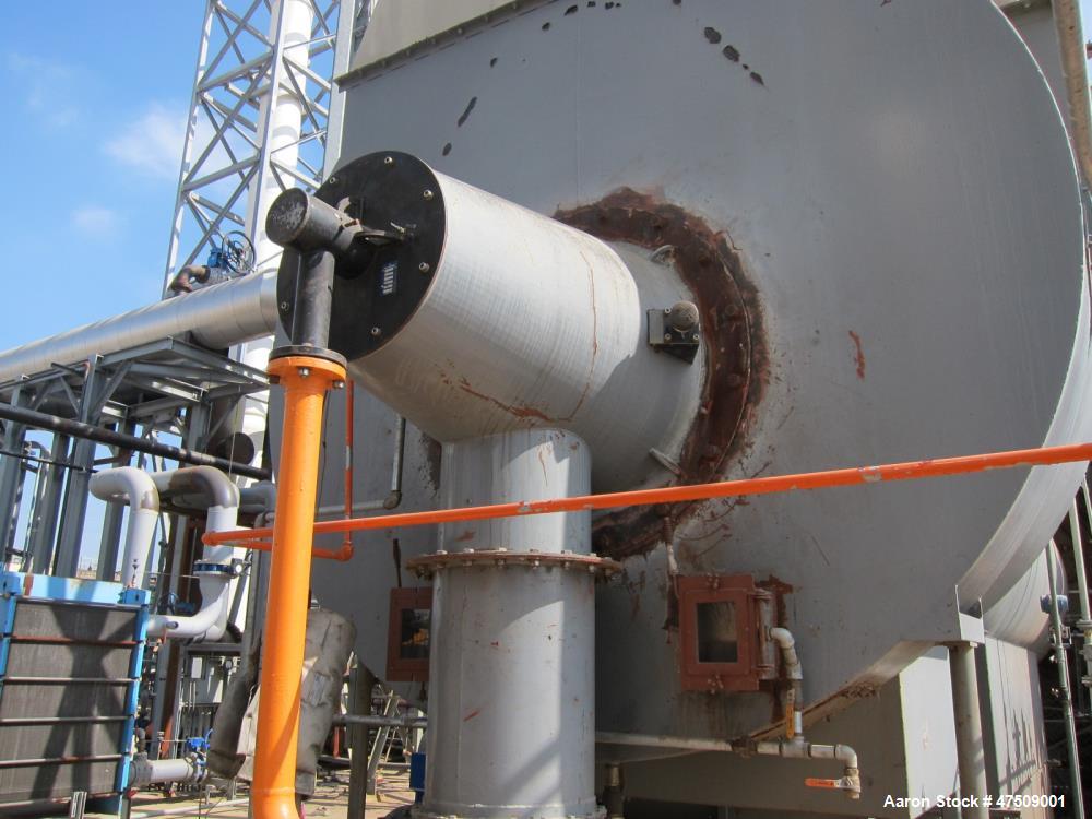 Used Baker Rullman BioSolids Dryer, Model SD125-48, (3) Triple Pass design. Insulated drum is 13'-1/2" diameter X 44'-3/4" long c/c of running bands. 3 Concentric cylinders, Rated 21.4 MMBtu/hr. Cons...