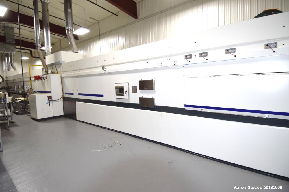 Used Dong Yang Food Machinery LPG Direct Cyclotherm Hybrid Oven. (3) Zones total, (1) direct heating section approximate 10.6m long, (2) indirect heating zones approximate 26m total. Baking length 37...