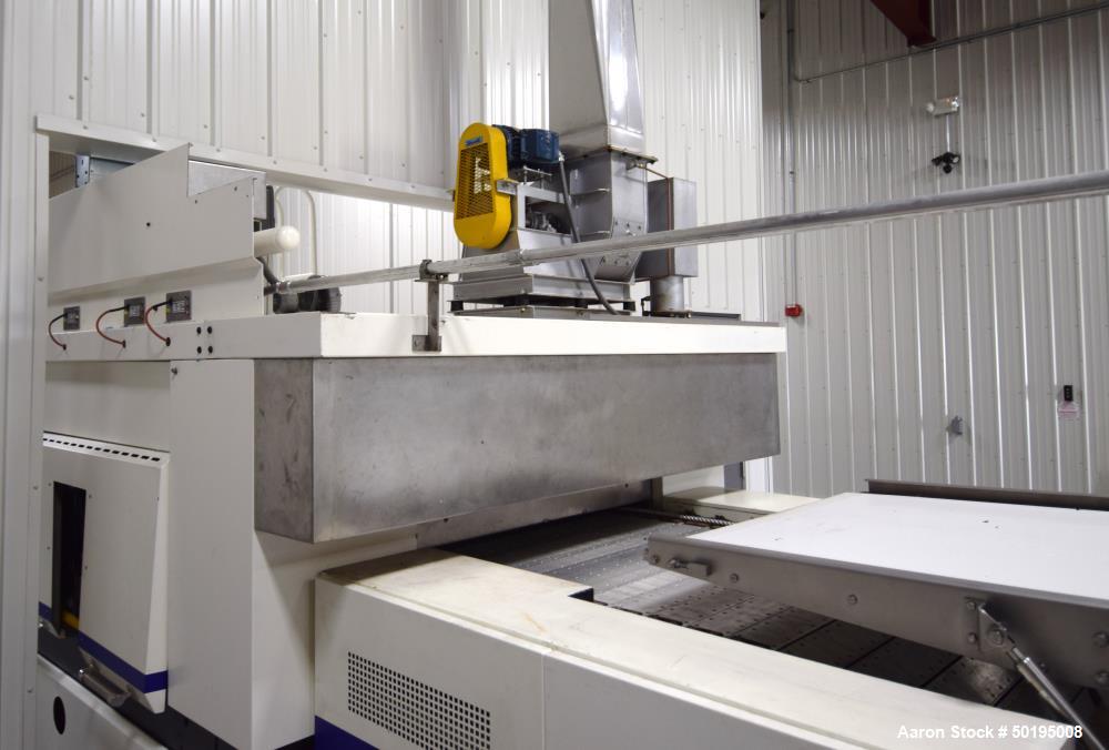 Used Dong Yang Food Machinery LPG Direct Cyclotherm Hybrid Oven. (3) Zones total, (1) direct heating section approximate 10.6m long, (2) indirect heating zones approximate 26m total. Baking length 37...