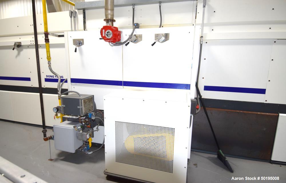 Used Dong Yang Food Machinery LPG Direct Cyclotherm Hybrid Oven. (3) Zones total, (1) direct heating section approximate 10.6m long, (2) indirect heating zones approximate 26m total. Baking length 37...
