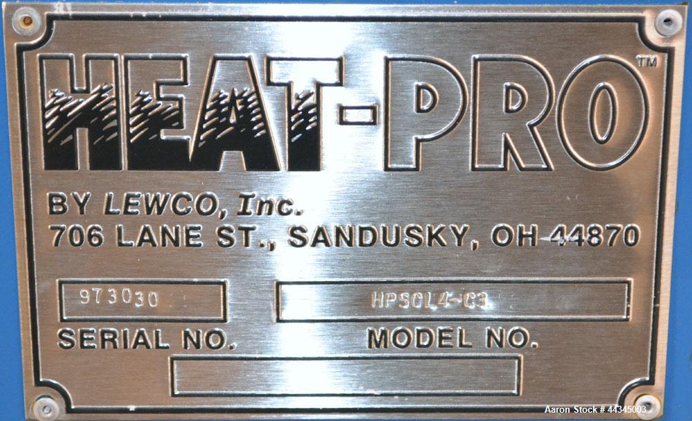 Used Heat-Pro Low Profile Drum Heating Oven, Model HPSCL4-C3, Carbon Steel. Heating medium saturated steam up to 200 psig, 34 square feet heating surface area, capacity (4) 55 gallon drums. Chamber a...
