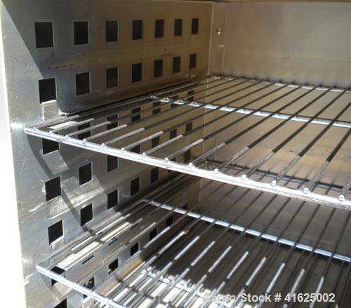 Used Lindberg Blue M Mechanical Oven, Model MO1430A-1. 304 stainless steel. 1.8 cubic feet chamber 13" wide x 15" high x 16" deep with internal shelves. Temperature range 40 deg C to 300 deg C (104 t...
