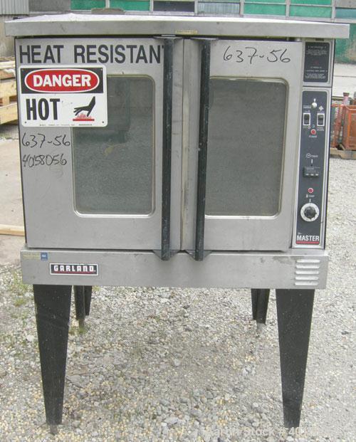 Used Garland Master Electric Convection Oven, 430/40 Stainless Steel.  Interior measures 29" (736 mm) wide x 24" (610 mm) high x 24" (610 mm) deep. Back mounted 1/2 hp, 1/100-155/200-230 volt, 1725/1...