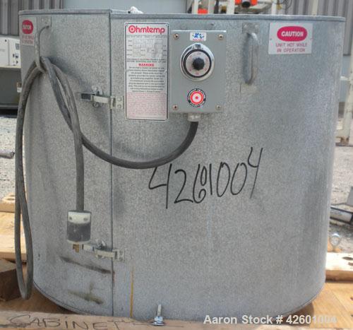 Used Ohmtemp 55 Gallon Drum Heater, model SWL-55-2301, carbon steel. Wrap-around design. Approximate 24" diameter x 30" deep compartment. 4.4 kW, 1/60/20 amp. Heaters and controls 230 volt. Manually ...