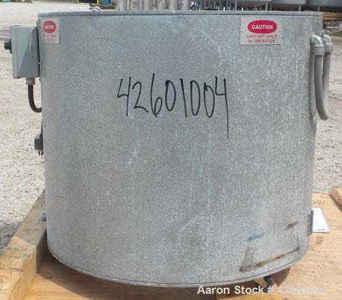 Used Ohmtemp 55 Gallon Drum Heater, model SWL-55-2301, carbon steel. Wrap-around design. Approximate 24" diameter x 30" deep compartment. 4.4 kW, 1/60/20 amp. Heaters and controls 230 volt. Manually ...
