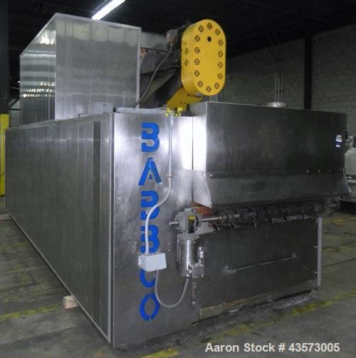 Used- Babbco Indirect Gas Fired Tunnel Oven. C.H. Babb Co Inc oven has a 48"W metal ban coinveyor chain. Chamber measures 20...