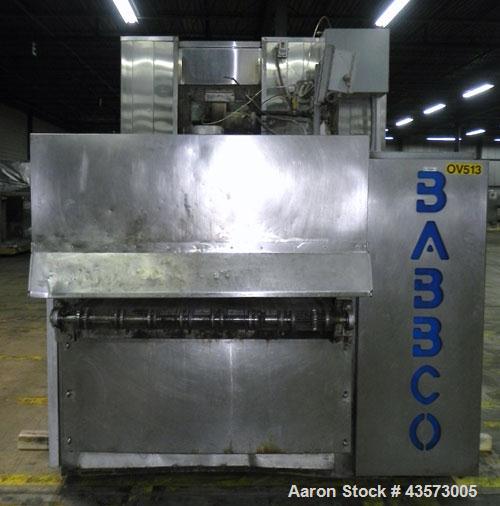 Used Babbco Indirect Gas Fired Tunnel Oven. C.H. Babb Co Inc oven has a 48"W metal ban coinveyor chain. Chamber measures 20'L Overall size is . 240"L x120"W x90"T. Last running pans of pizza crust. O...