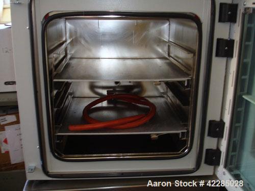 Used Binder Vacuum Drying Oven, Model VDC 115. Chamber interior volume 4.1 cubic feet, approximately 17.7" deep x 19.9" wide x 19.9" tall. Maximum temperature to 320 deg F. Mounted on a stand, includ...
