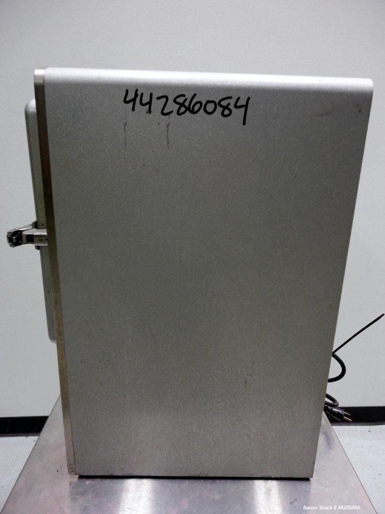 Used Precision Scientific Thelco Oven, Model 26. Temperature range to 200 degrees C. (392 F). Interior approximate 13" wide x 13" tall x 13" deep. Hinged front door. 1/50/60/120 volt, 8 amp, 950 watt...