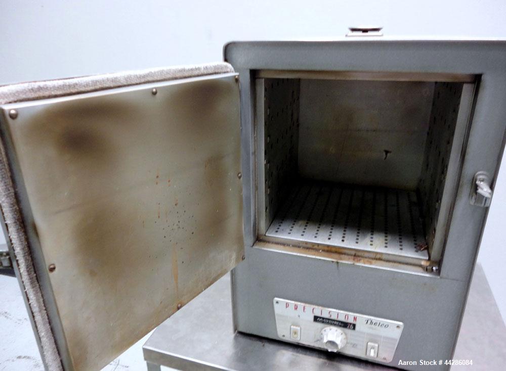 Used Precision Scientific Thelco Oven, Model 26. Temperature range to 200 degrees C. (392 F). Interior approximate 13" wide x 13" tall x 13" deep. Hinged front door. 1/50/60/120 volt, 8 amp, 950 watt...