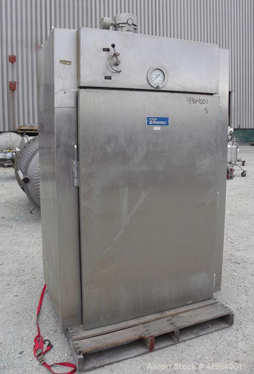 Used Stokes Drying Cabinet, Model 38-7, 304 stainless steel. Opening 40 wide x 63 tall x 30 deep. Includes a stainless steel roll out cart with (24) aluminum trays, 35 wide x 27 deep, spaced 1 apart....