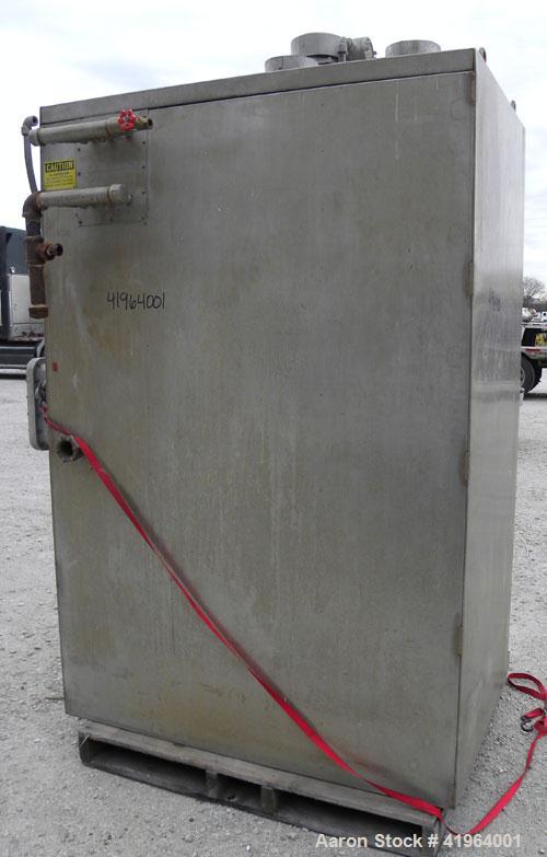 Used Stokes Drying Cabinet, Model 38-7, 304 stainless steel. Opening 40 wide x 63 tall x 30 deep. Includes a stainless steel roll out cart with (24) aluminum trays, 35 wide x 27 deep, spaced 1 apart....