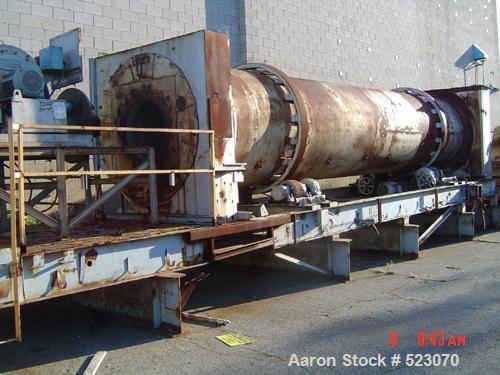 USED: Rotary dryer, approximately 4'6" x 40' long, natural gas direct fire. (Assuming refractory lined), insulated shell, skid mounted.
