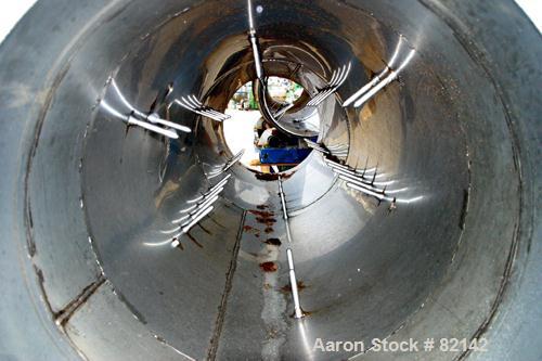USED: Griffin and Co Conditioning Cylinder, 304 stainless steel. 24" diameter x 8' long tube with internal pins. Requires feed chute, includes end discharge hood. Driven by a 3/4 hp, 3/60/230/460 vol...