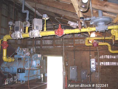 USED: Heil model 85-24, 8'5" diameter x 24'5" long, single pass,rotary drum dryer system with new 15 million btu oil/natural gasburners, remote auto-controls and electrical. Complete with feeder,trun...