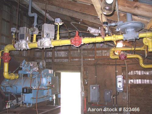 USED: Heil model 85-24, 8'5" diameter x 24'5" long, single pass,rotary drum dryer system with new 15 million btu oil/natural gasburners, remote auto-controls and electrical. Complete with feeder,trun...