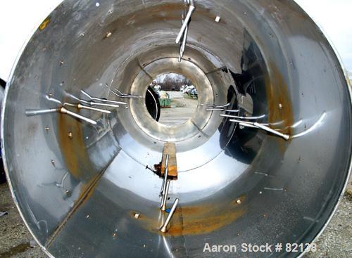 USED: Conditioning Cylinder, 304 stainless steel. 30" diameter x 8' long tube with internal pins. Requires feed chute, includes end discharge hood. Driven by an approximate 2 hp Reeves varispeed moto...