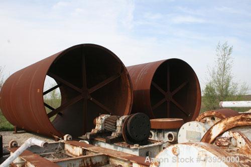 Used Rotary Kiln Shell, 12' diameter, in 4 pieces: 20', 30', 36' and 24' for a total length of 110'. Includes various kiln parts including trunions, girth gear and tire.
