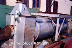 USED: Indirect Heating Kiln, overall approximately 8' high x 6' wide x 40' long. Attached to it is a combustion unit 13' long X 3' diameter. Kiln has stainless steel flexible conveyor running full le...