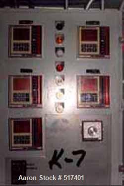 USED: Indirect Heating Kiln, overall approximately 8' high x 6' wide x 40' long. Attached to it is a combustion unit 13' long X 3' diameter. Kiln has stainless steel flexible conveyor running full le...