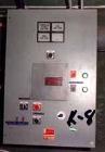 USED: Indirect Heating Kiln, overall approximately 8' high x 6' wide x 40' long. Attached to it is a combustion unit 13' long X 3' diameter. Kiln has stainless steel flexible conveyor running full le...