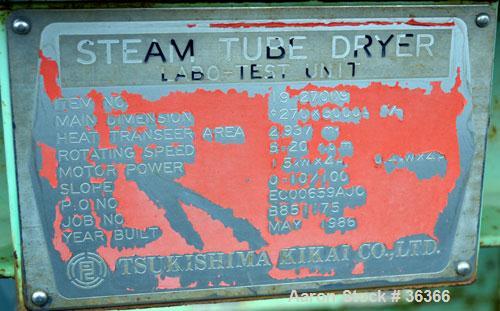 Used Tsukishima Kikai Rotary Steam Tube Dryer, Model Labo-Test, 304 Stainless Steel. Tube approximate 270 mm (10.6’’) diameter x 3000 mm (118") long, with (10) 1" diameter x 120" long tubes, approxim...