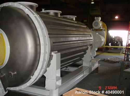 Used Buss rotary vacuum dryer, type S6300. Material of construction is 316 stainless steel on product contact parts. 304 stainless flat channel jacket. 293 cu ft (8300 liter) total capacity, 211 cu f...