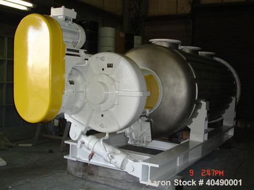 Used Buss rotary vacuum dryer, type S6300. Material of construction is 316 stainless steel on product contact parts. 304 stainless flat channel jacket. 293 cu ft (8300 liter) total capacity, 211 cu f...