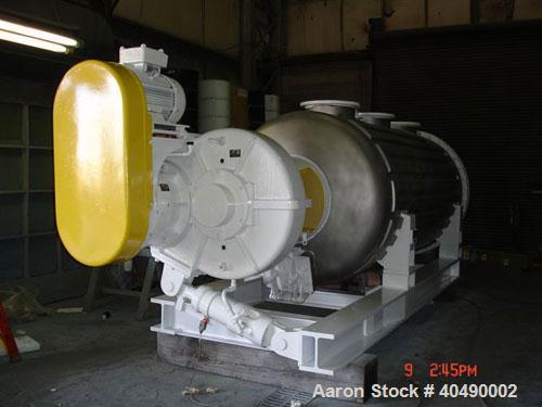 Used Buss rotary vacuum dryer, type S6300. Material of construction is 316 stainless steel on product contact parts. 304 stainless flat channel jacket. 293 cu ft (8300 liter) total capacity, 211 cu f...