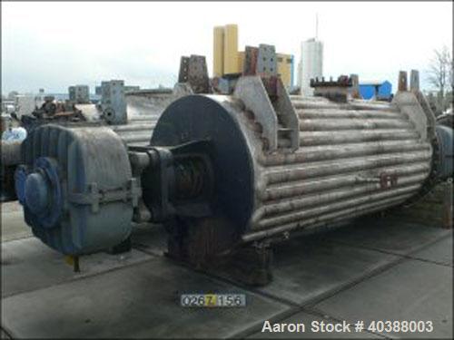 Used Buss Rotary Vacuum Dryer, Type SF6300. Material of construction is 316 stainless steel on product contact parts. Stainless half pipe coil channel jacket. 211 cubic feet (6300 liter) working capa...