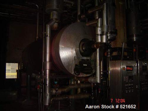 USED: Buss rotary vacuum dryer, 141 cu ft (4000 liter). Material ofconstruction is stainless steel on product contact parts. 52" diameterx 128" straight side (1380mm x 3250mm) body. Dished heads, one...