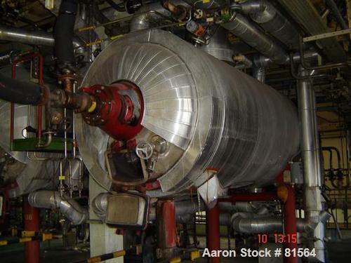 USED: Buss rotary vacuum dryer, 141 cu ft (4000 liter). Material of construction is stainless steel on product contact parts. 52" diameter x 128" straight side (1320mm diameter x 3250mm straight side...