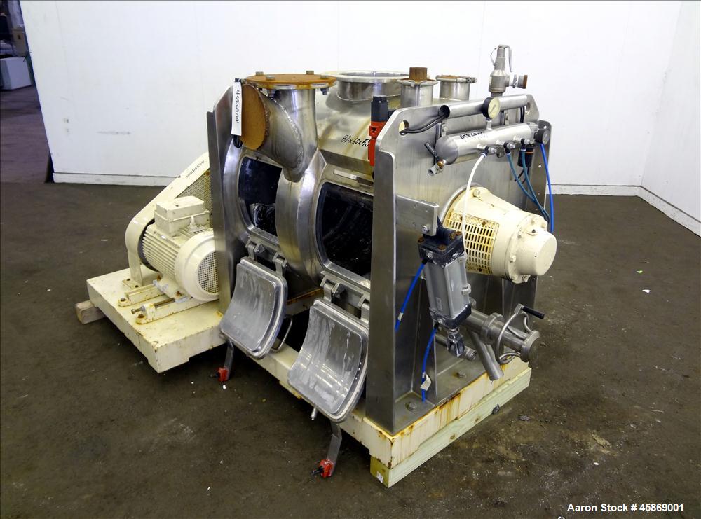 Used E. Bachiller Plow Mixer Dryer, 10.6 Cubic Feet (300 Liter), Model MMT 300, 304 Stainless Steel. Jacketed mixing chamber approximate 26" diameter x 33" long. Internal rated atmospheric at 212 deg...
