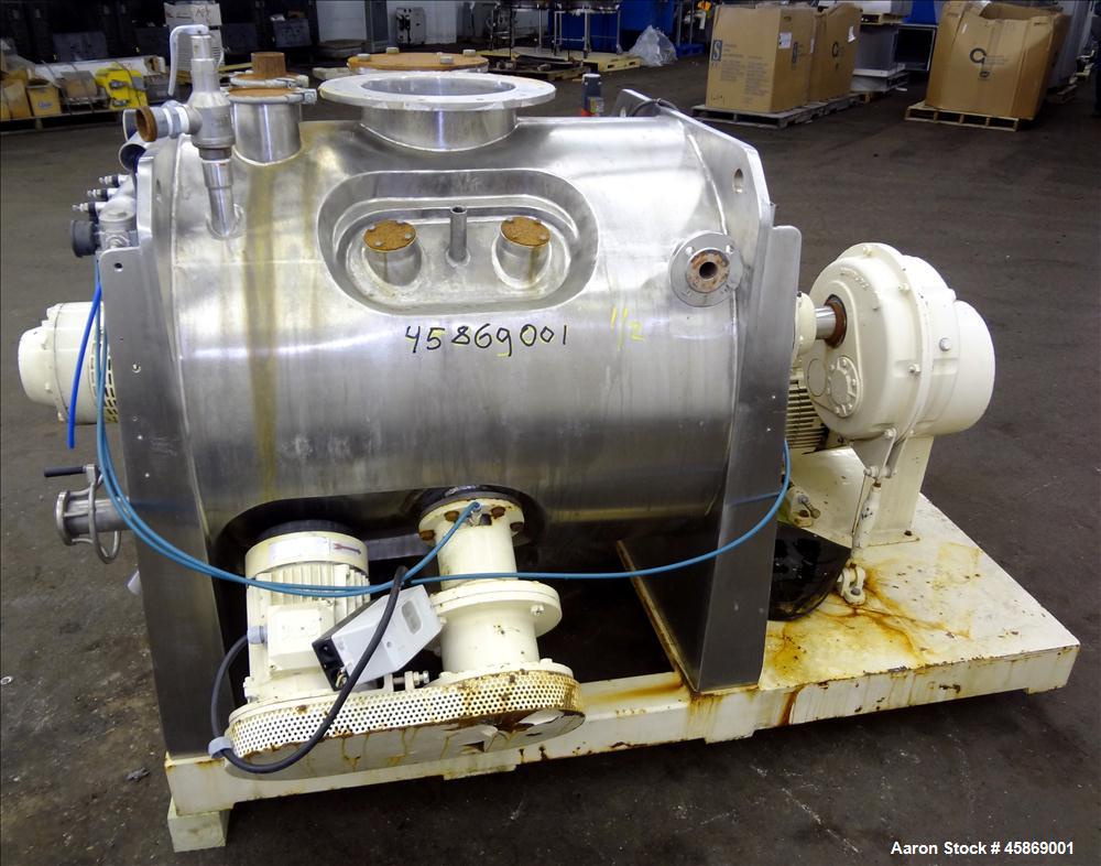 Used E. Bachiller Plow Mixer Dryer, 10.6 Cubic Feet (300 Liter), Model MMT 300, 304 Stainless Steel. Jacketed mixing chamber approximate 26" diameter x 33" long. Internal rated atmospheric at 212 deg...