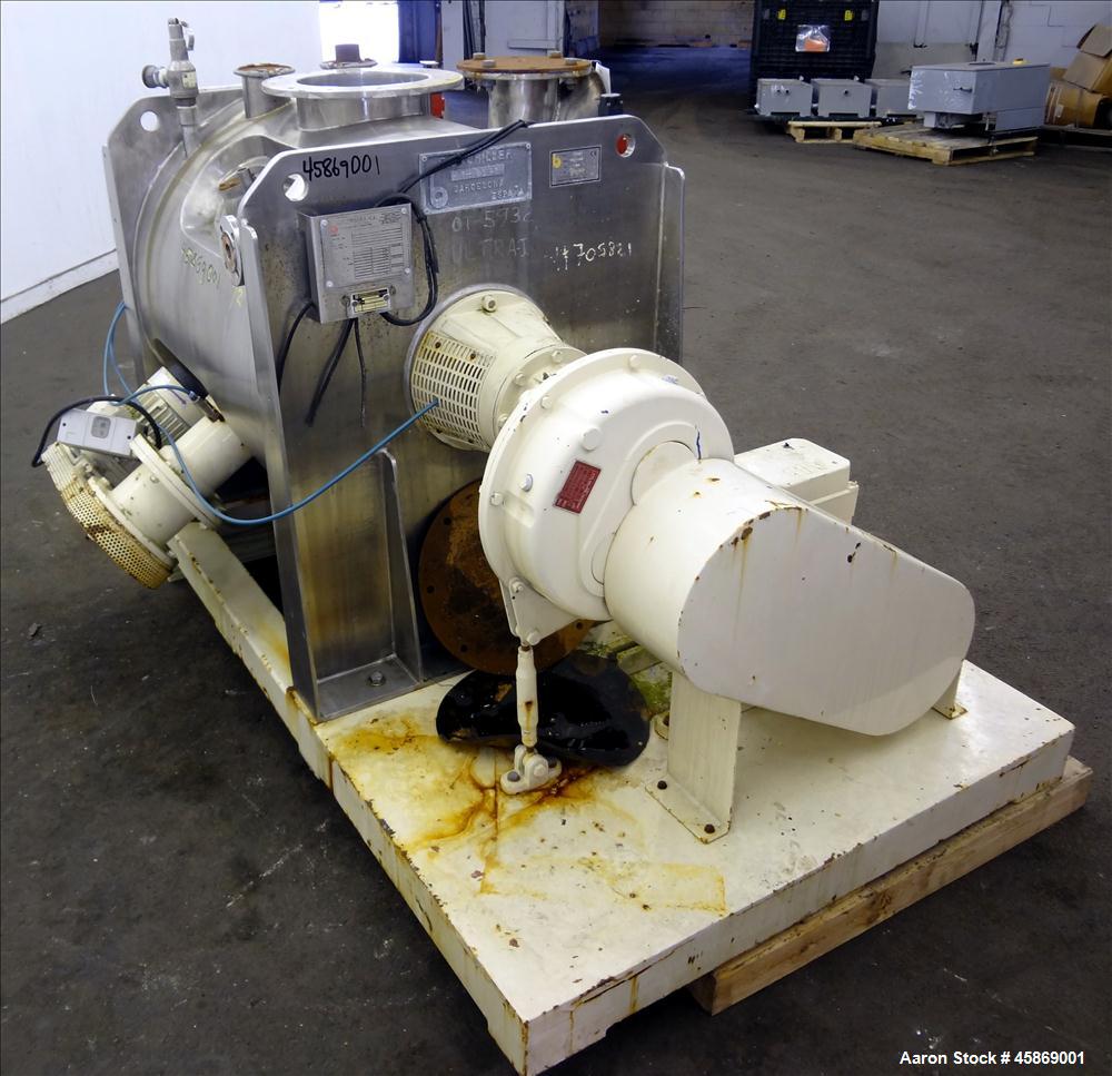 Used E. Bachiller Plow Mixer Dryer, 10.6 Cubic Feet (300 Liter), Model MMT 300, 304 Stainless Steel. Jacketed mixing chamber approximate 26" diameter x 33" long. Internal rated atmospheric at 212 deg...