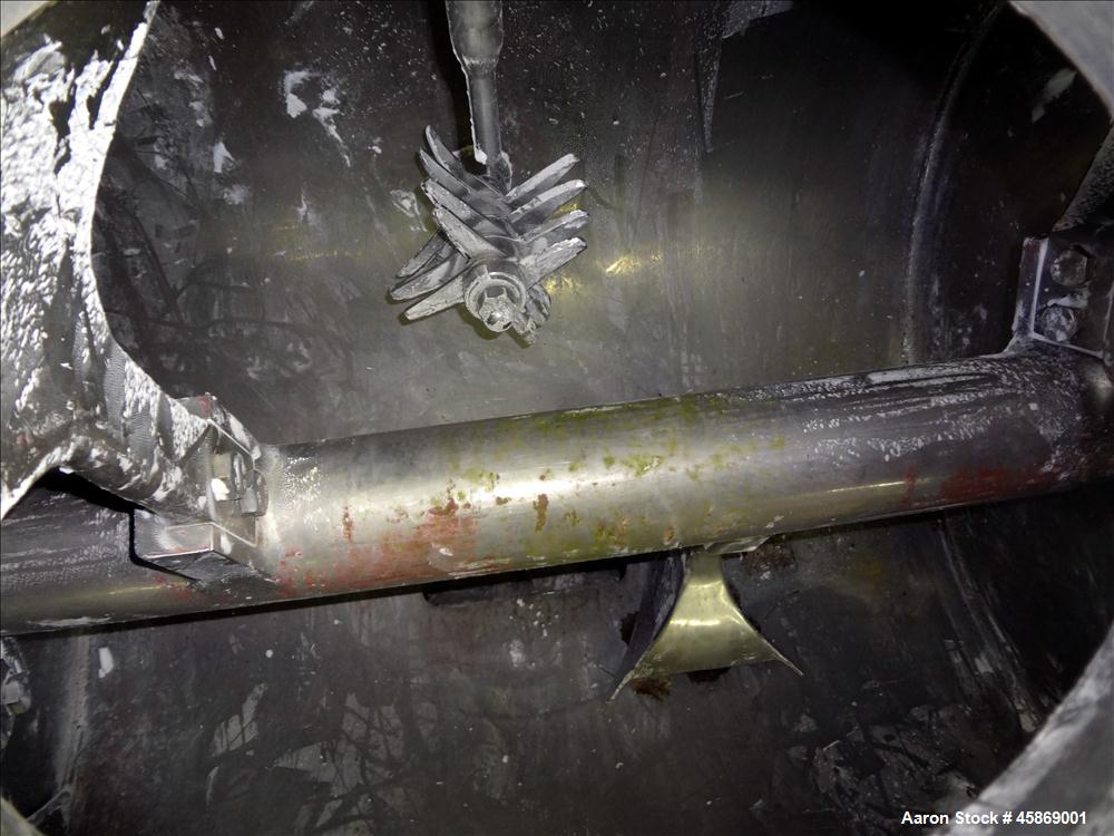 Used E. Bachiller Plow Mixer Dryer, 10.6 Cubic Feet (300 Liter), Model MMT 300, 304 Stainless Steel. Jacketed mixing chamber approximate 26" diameter x 33" long. Internal rated atmospheric at 212 deg...