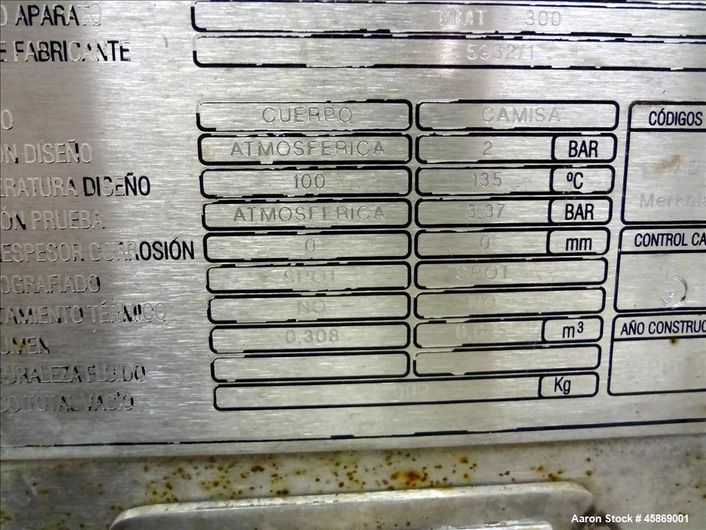 Used E. Bachiller Plow Mixer Dryer, 10.6 Cubic Feet (300 Liter), Model MMT 300, 304 Stainless Steel. Jacketed mixing chamber approximate 26" diameter x 33" long. Internal rated atmospheric at 212 deg...