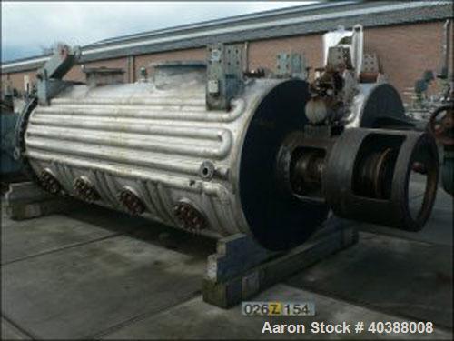 Used Giovanola Rotary Vacuum Dryer. Material of construction is 316TI stainless steel on product contact parts. Stainless half pipe coil jacket. 256 cubic feet (7270 liter) working capacity. 4’9" dia...