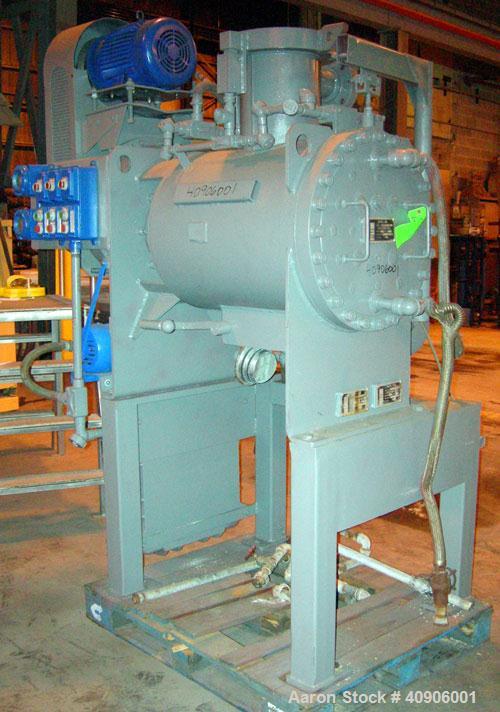 Used Littleford Polyphase Mixer Reactor Dryer, Model DVT-130. 304 stainless steel. 4.6 cubic feet total capacity, 2.8 cubic feet working.  Approximately 20" diameter x 24" long.  4" diameter shaft wi...