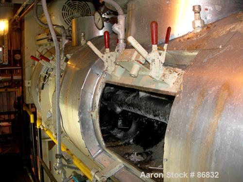 USED: Littleford plow mixer/dryer, model FKM1200D, stainless steel. 26 cubic feet working capacity, 43.4 total. Jacketed chamber approximately 32" diameter x 96" long. Internal rated FV at 320 deg F,...