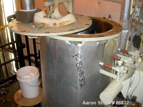 USED: Littleford plow mixer/dryer, model FKM1200D, stainless steel. 26 cubic feet working capacity, 43.4 total. Jacketed chamber approximately 32" diameter x 96" long. Internal rated FV at 320 deg F,...