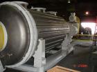 Used Buss rotary vacuum dryer, type S6300. Material of construction is 316 stainless steel on product contact parts. 304 stainless flat channel jacket. 293 cu ft (8300 liter) total capacity, 211 cu f...