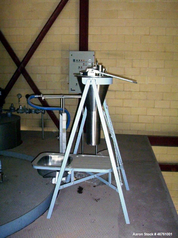 Used APV Anhydro Conical Spray Dryer. Type CSD No 65, stainless steel. Dryer body is approximately 90" diameter x 20 high including cone.  Rated 100 Kg/hour. 12% Solids, water evaporation: 87 Kg/hour...