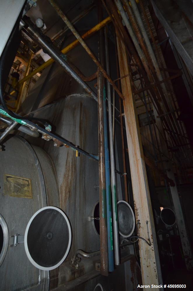 Used Damrow Drying System Stainless Steel. Approximate capacity 4,000 pounds per hour of powder with 5% moisture Whey capacity out. Consists of: (1) Spray Dryer, Stainless Steel. (7) Top entering noz...