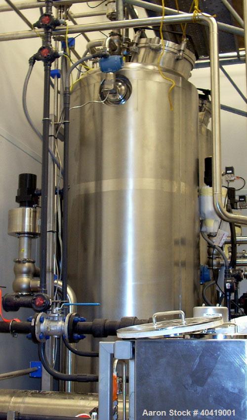 Used Niro Pharma spray dryer, model PSD-4, all stainless steel construction. The dryer is rated for 62 Kilos/ hour - 30% Solids.  Includes supply fan, process heater, receiver, condenser, primary cyc...