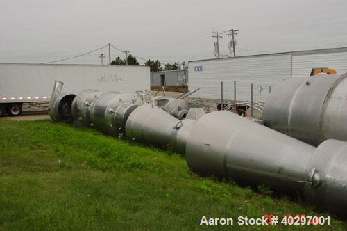 Used Niro spray tower/spray dryer. 23' diameter x 41' tall, 304 stainless steel construction. Main chamber is double walled and insulated. Unit has a fluid bed unit with three steam coil heater units...