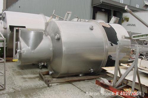 Used Niro spray tower/spray dryer. 23' diameter x 41' tall, 304 stainless steel construction. Main chamber is double walled and insulated. Unit has a fluid bed unit with three steam coil heater units...